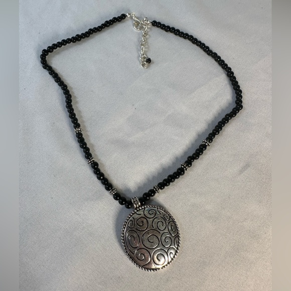 Three black and silvertone vibe necklaces - Picture 6 of 6